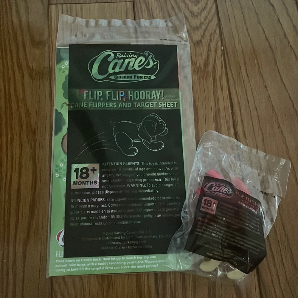NWT Raising Cane’s “Flip, Flip, Hooray!” cane flippers and target sheet